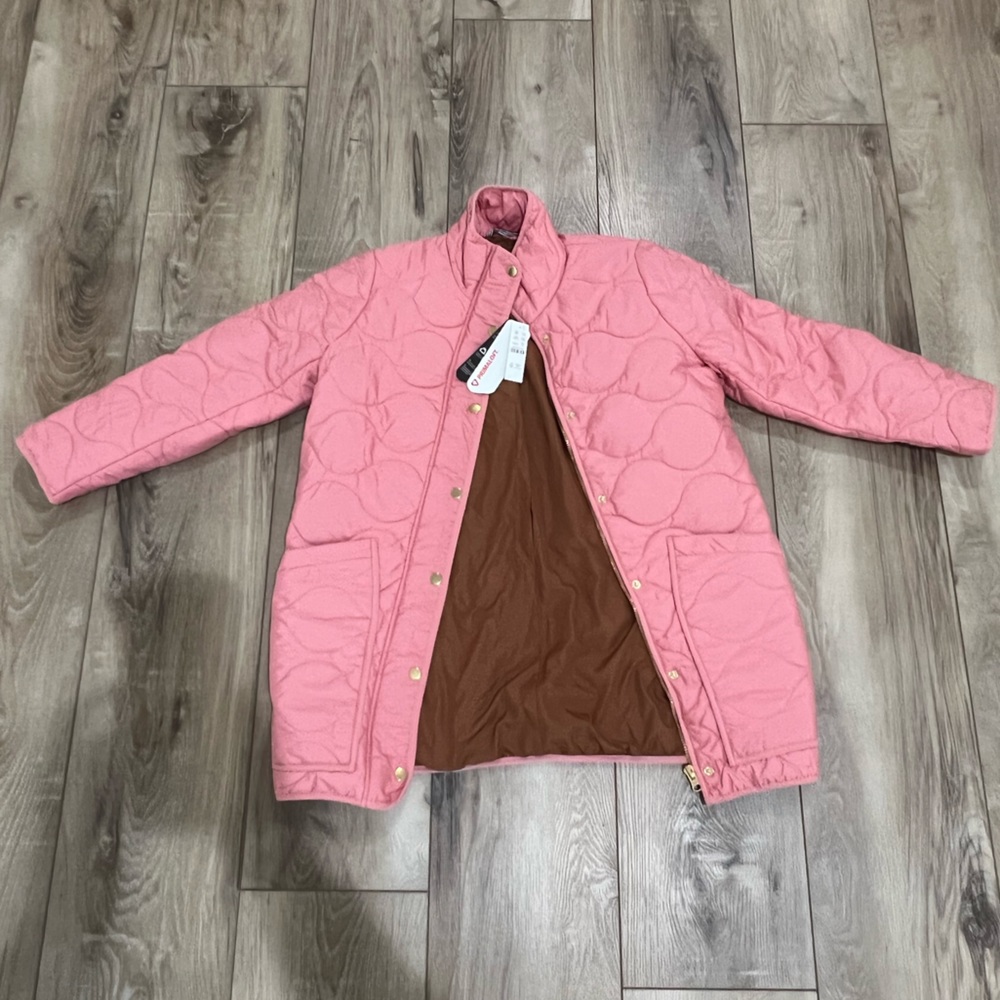 Never been worn brand new with tags it’s a size small petite